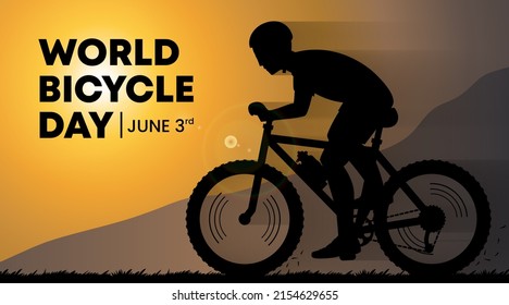 World bicycle day background with a man riding a bicycle