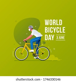 World Bicycle Day Concept. 
Men wear mask that ride bicycle
