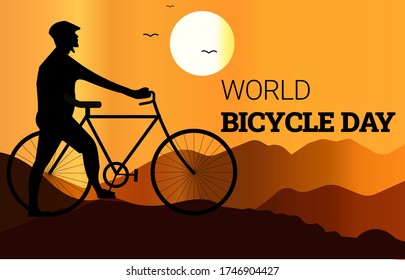 World Bicycle Day in June strong Fit man holding bicycle on mountain at sunset point