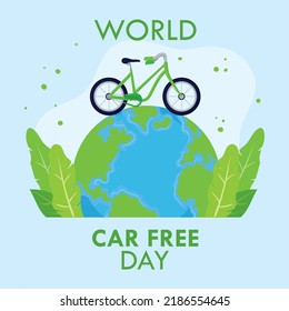 world car free day poster with globe and bike