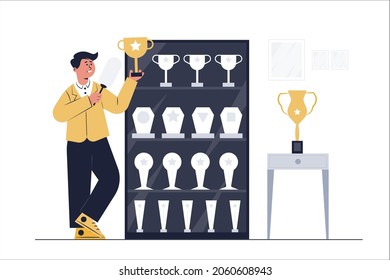 World champion athletes have won trophies from many competitions. He was cleaning these cups. 