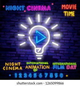 World Cinema Day December 28 illustration neon sing, label and logo. Cinema banner Design template, logo, emblem and label. Bright signboard, nightly bright advertising. Movie logo. Vector