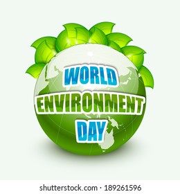 World Environment Day concept with shiny world globe, green leaves and stylish text on blue background.