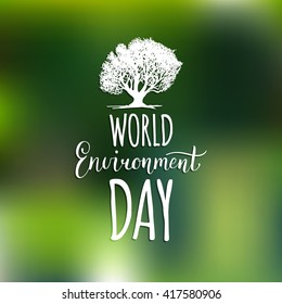 World environment day hand lettering card on blurred background. Vector illustration. 