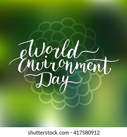 World environment day hand lettering card on blurred background. Vector illustration. 