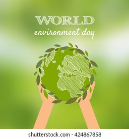 World environment day vector card, poster on blur green background. Hands holding the earth globe. Vector illustration.