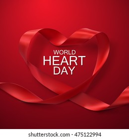 World Heart Day Background. Realistic satin ribbon heart with World Heart Day label. Vector illustration. Medical awareness day concept