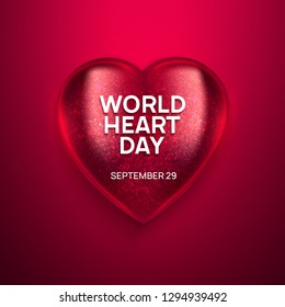 World Heart Day realistic vector illustration. 3D glass shiny heart on red background. Health awareness day.