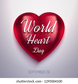 World Heart Day realistic vector illustration. 3D glass shiny heart on light background. Health awareness day.