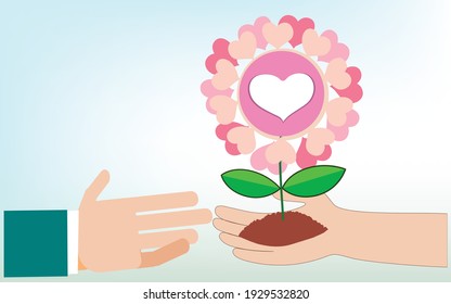 World Love Concept and Environmental Conservation,Heart tree in hand on blue background