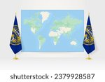 World Map between two hanging flags of Nebraska on flag stand. Vector illustration for diplomacy meeting, press conference and other.