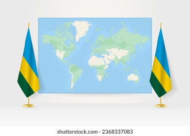 World Map between two hanging flags of Rwanda on flag stand. Vector illustration for diplomacy meeting, press conference and other.