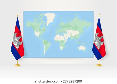 World Map between two hanging flags of Cambodia on flag stand. Vector illustration for diplomacy meeting, press conference and other.