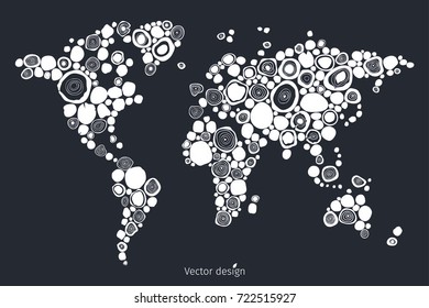World map carving on white circle on a dark gray background, cross section of the tree.
