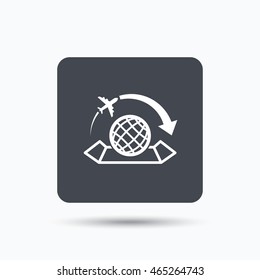 World map icon. Globe with arrow sign. Plane travel symbol. Gray square button with flat web icon. Vector