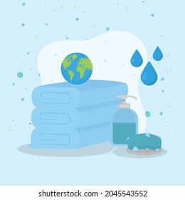 world on towels with soaps on blue background
