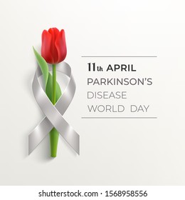 World Parkinson's disease day card with gray photorealistic ribbon and red rose on a light background. Silver ribbon day