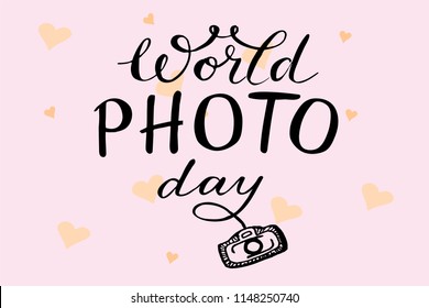 World Photo Day Vector Illustration on pind backround with hearts and handdrawn camera icon. Suitable for poster, banner, celebration badge and greeting card.