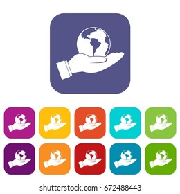 World planet in man hand icons set vector illustration in flat style In colors red, blue, green and other