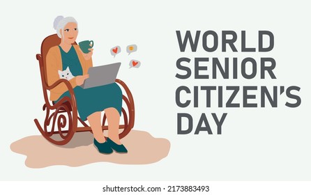World Senior Citizen's Day. Happy grandmother with the laptop computer