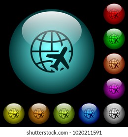 World travel icons in color illuminated spherical glass buttons on black background. Can be used to black or dark templates