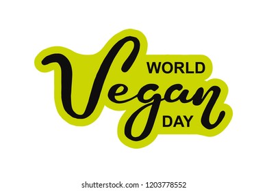 World vegan day. International november holiday. Hand drawn lettering typography isolated on green leaves background. Vector calligraphy for posters, web sites, cards, t-shirts, party decor.