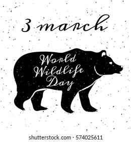 World Wildlife Day, 3 March. Grunge background with black silhouette of bear and lettering
