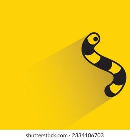 worm with shadow on yellow background