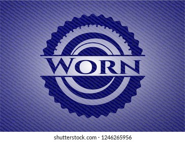 Worn emblem with denim texture