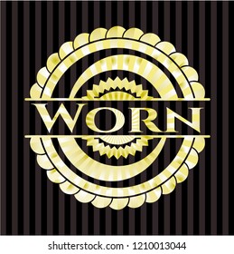 Worn golden badge