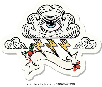 worn old sticker with banner of an all seeing eye cloud