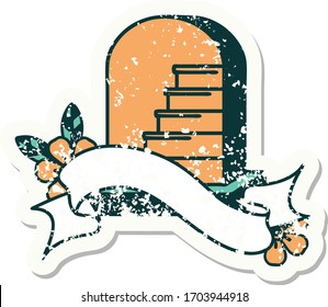worn old sticker with banner of a grave stone