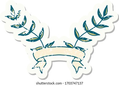 worn old sticker with banner of leaves