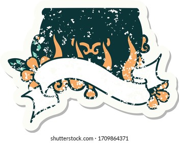worn old sticker with banner of a lit cauldron