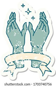 worn old sticker with banner of mystic hands