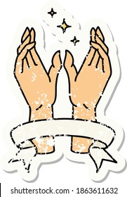 worn old sticker with banner of mystic hands