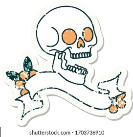worn old sticker with banner of a skull