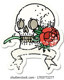worn old sticker with banner of a skull and rose