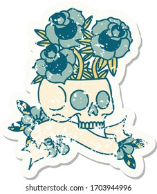 worn old sticker with banner of a skull and roses