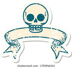 worn old sticker with banner of a skull