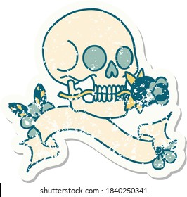 worn old sticker with banner of a skull