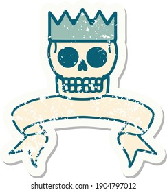 worn old sticker with banner of a skull and crown