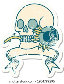 worn old sticker with banner of a skull and rose