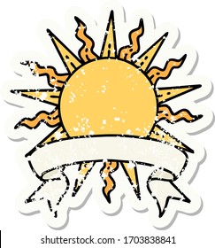 worn old sticker with banner of a sun