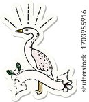 worn old sticker of a tattoo style standing stork