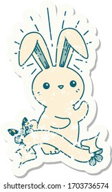 worn old sticker of a tattoo style cute bunny