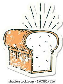 worn old sticker of a tattoo style loaf of bread