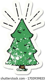worn old sticker of a tattoo style pine tree