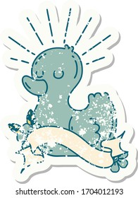 worn old sticker of a tattoo style rubber duck