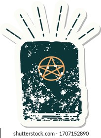 worn old sticker of a tattoo style spellbook 